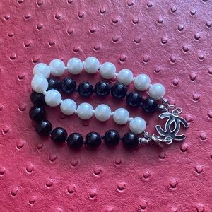 CHANEL Black and White Beaded Bracelet Set with Silver CC Charm